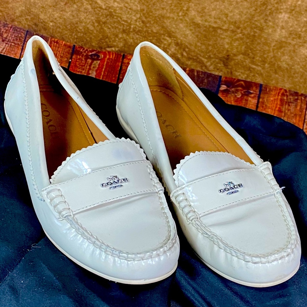 Coach women’s patent leather cream loafers Sz. 9